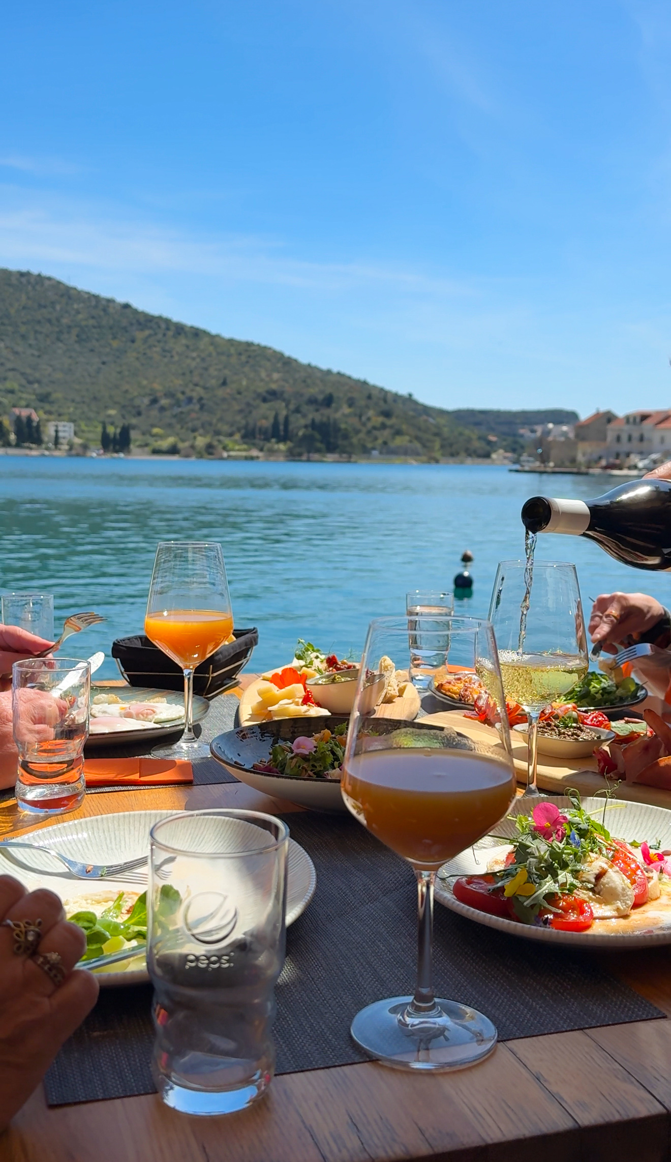Pouring local wine at Dandy restaurant, Zaton